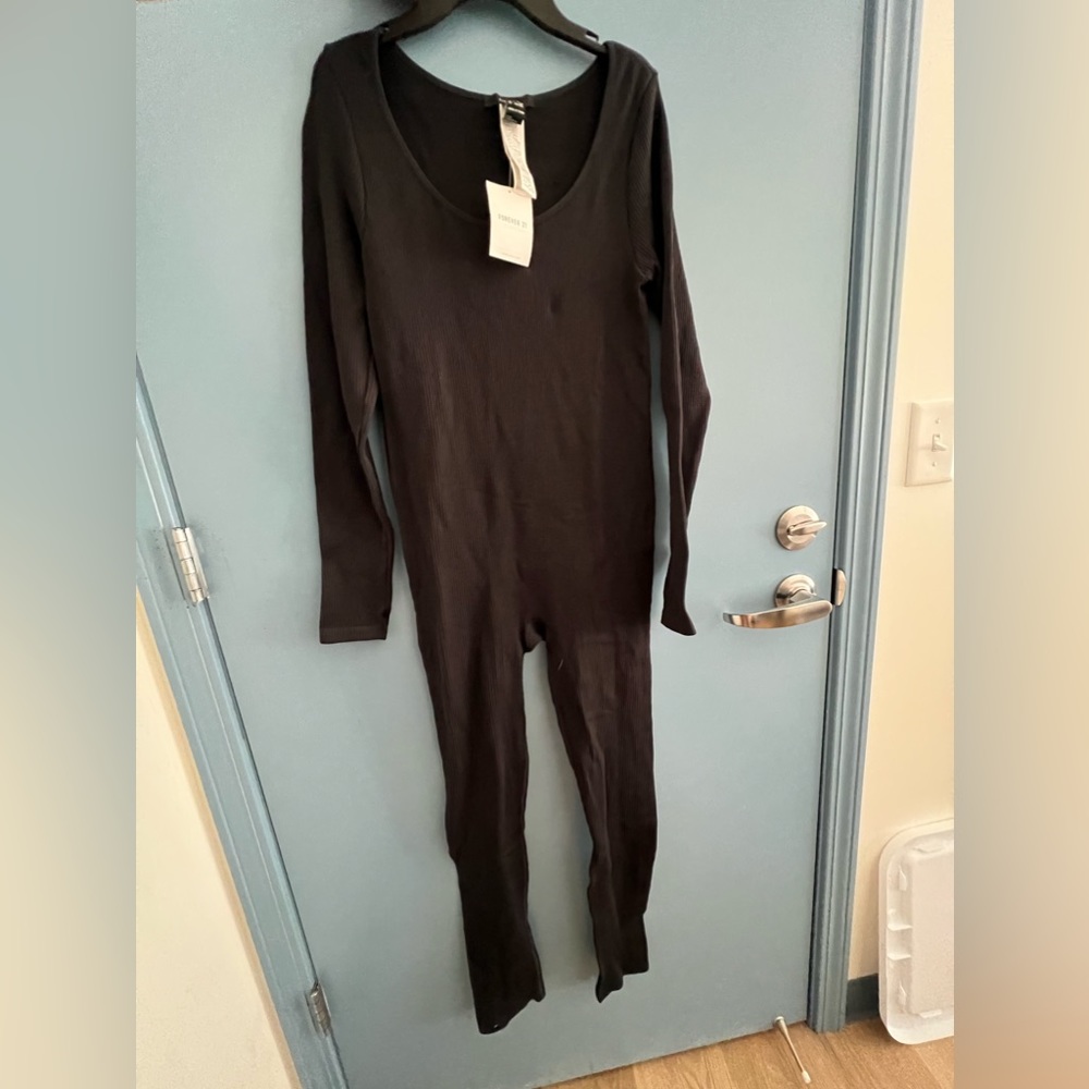 Forever 21 long sleeve romper. Size s/m. *wrinkled bc folded up*